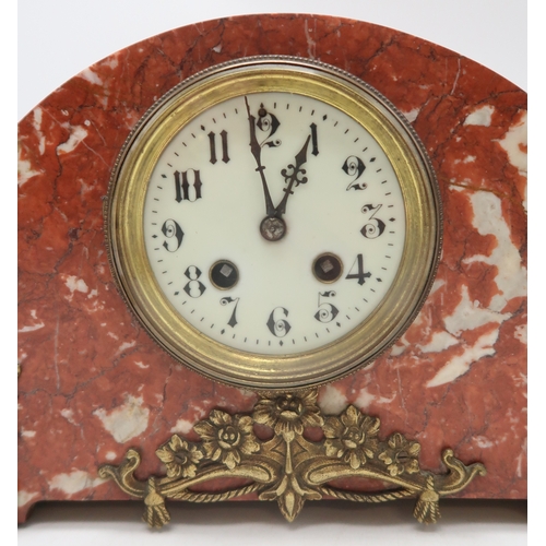 2164 - A FRENCH RED MARBLE MANTEL CLOCKwith enamel dial and painted Arabic numerals, the case with ormolu m... 