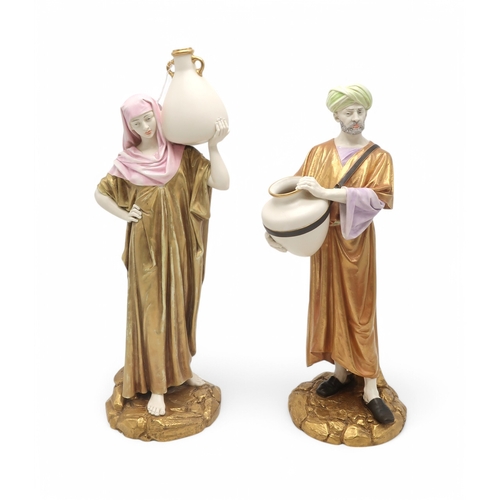 2165 - A PAIR OF LARGE ROYAL WORCESTER FIGURESmodelled as water carriers, after James Hadley, both with gil... 