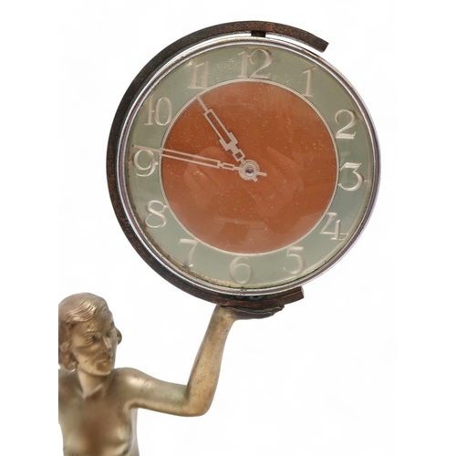 2169 - AN ART DECO FIGURAL CLOCKmodelled as a kneeling semi clad female holding aloft the circular clock, u... 