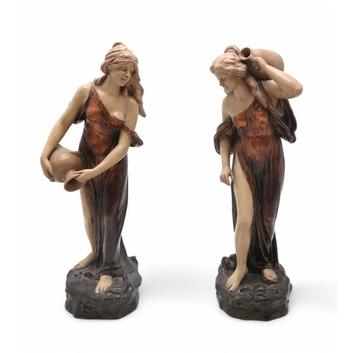 2170 - A PAIR OF AUSTRIAN ART NOUVEAU FIGURESeach modelled as a female water carrier, designed by... 