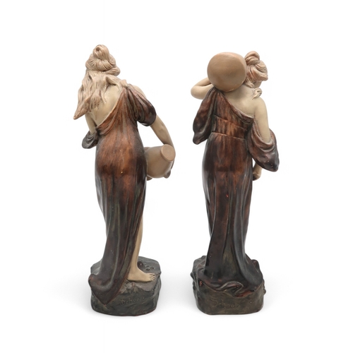 2170 - A PAIR OF AUSTRIAN ART NOUVEAU FIGURESeach modelled as a female water carrier, designed by... 