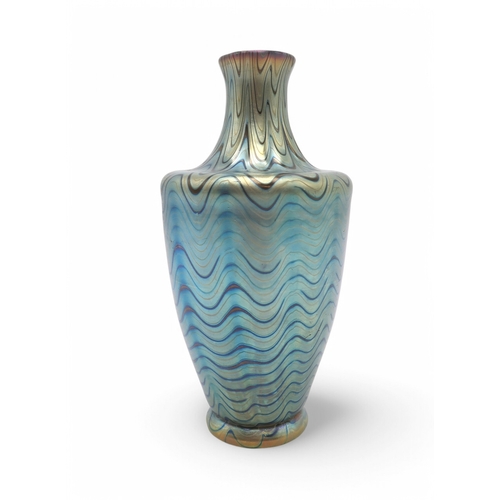 2180 - A LOETZ GLASS VASEof shouldered tapering form, with wavy iridescent blue and gold design, 20.5cm hig... 