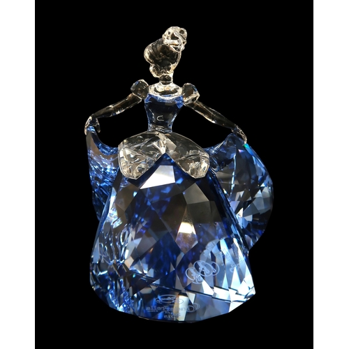 2190 - A SWAROVSKI CRYSTAL WALT DISNEY FIGURE OF CINDERELLAcirca 2015, in clear and blue crystal, 13.5cm hi... 