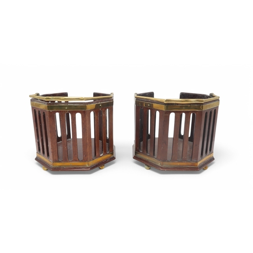 2217 - A PAIR OF GEORGE III MAHOGANY AND BRASS PLATE BUCKETSof octagonal form with pierced sides and shaped... 