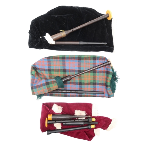 2518 - TWO GOOSE PRACTICE PIPESOne featuring a Macdonald tartan bag cover with a chanter marked J. TWEEDIE ... 