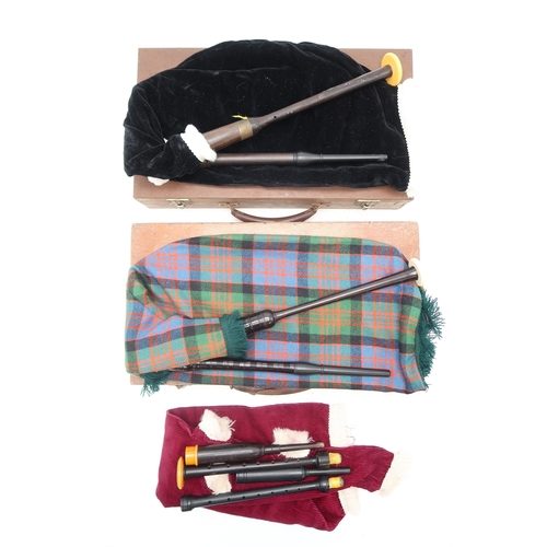 2518 - TWO GOOSE PRACTICE PIPESOne featuring a Macdonald tartan bag cover with a chanter marked J. TWEEDIE ... 