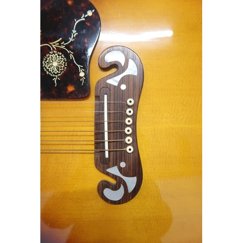 2524 - GIBSON J-200N c.1967Maple back and sides and a spruce top in a tobacco sunburst finish, abalone crow... 