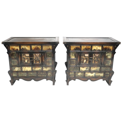 2039 - A PAIR OF CHINESE ELM COUNTER TOP APOTHECARY CABINETSwith pair of central doors amongst drawers on s... 