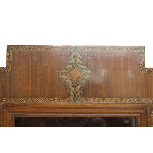 2043 - A PAIR OF EARLY 20TH CENTURY ART MAHOGANY AND FRUITWOOD INLAID DISPLAY CABINETSwith stepped tops ove... 