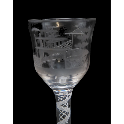 2220 - A COLLECTION OF 19TH CENTURY DRINKING GLASSESincluding a pair of wheat engraved tapering glasses, an... 