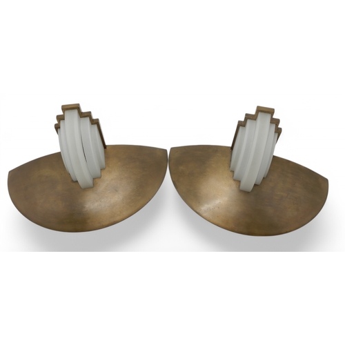 2227 - A PAIR OF ART DECO STYLE JEAN PERZEL WALL LIGHTSwith semi circular brass bowl, above curved and flat... 