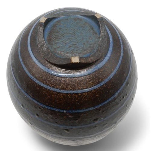 2229 - DAVID LLOYD JONES (1928-1994)A LARGE STUDIO POTTERY BOWLglazed in blue with ribbed detail, upon thre... 