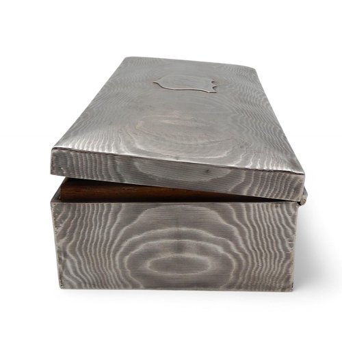 357 - An Edwardian silver cigarette box, by Fenton Brothers, Sheffield 1906, the body with engine-turned d... 