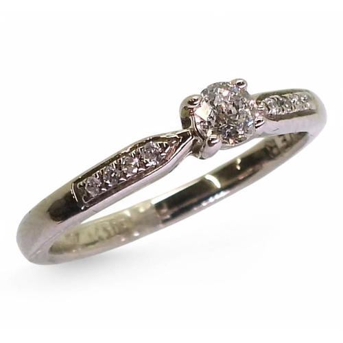 700 - A platinum forever diamond ring, set with a 0.21ct round modified brilliant cut, with further diamon... 