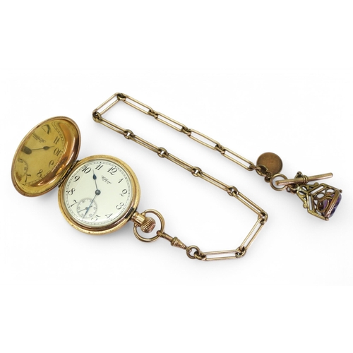 703 - A gold plated full hunter Waltham pocket watch and gold plated fob chain and fob seal. 