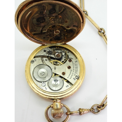 703 - A gold plated full hunter Waltham pocket watch and gold plated fob chain and fob seal. 