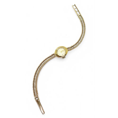 707 - A 9ct gold ladies Elco watch with integral strap, weight including mechanism 12.6gms