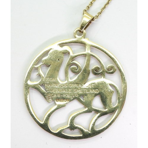 714 - A Shetland Silvercraft 9ct gold dragon pendant and chain, diameter of the pendant 4.6cm, weight 16gm... 