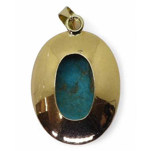 738 - A 14k gold pendant set with a large turquoise of approx 2cm x 1.3cm, weight 5.6gms