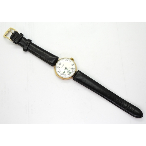 746 - A 9ct gold gents Benson vintage watch (winder loose) with a black size 16 leather strap, weight incl... 