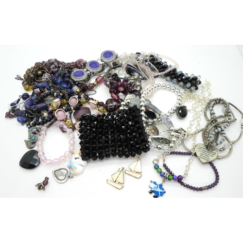 855 - *WITHDRAWN*Vintage costume jewellery to include, glass bead necklaces, a gold plated millefiori brac... 