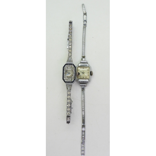 881 - A silver ladies watches, set with clear and blue gem marked Luz Geneve, and a steel example