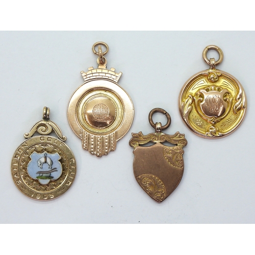 2560 - FOUR 9ct GOLD GOLFING MEDALSComprising a Baildon Golf Club 1905 ladies' enamelled medal by Fattorini... 