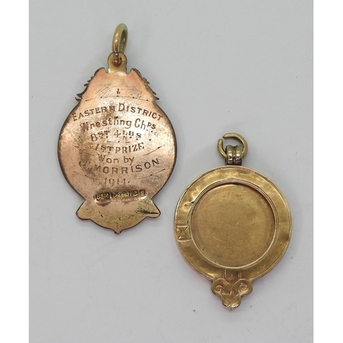 2561 - A 9ct GOLD WRESTLING MEDALBy Joseph Moore, Birmingham, engraved verso 