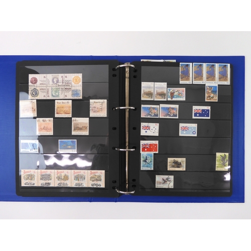 7021 - AUSTRALIA A collection of new and used stamps in three albums and a stock book to include booklets a... 