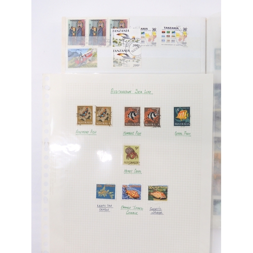 7021 - AUSTRALIA A collection of new and used stamps in three albums and a stock book to include booklets a... 