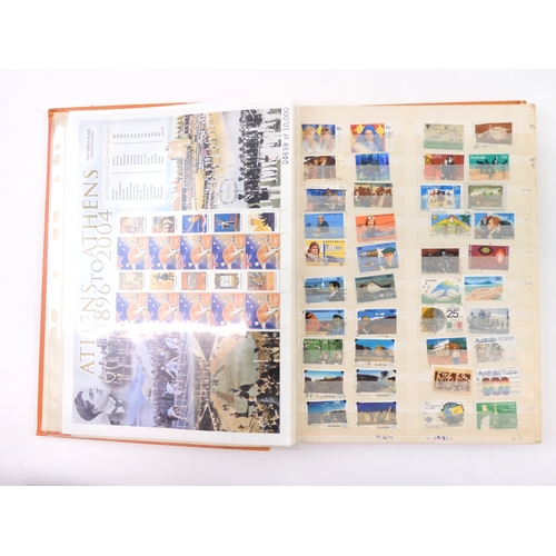 7021 - AUSTRALIA A collection of new and used stamps in three albums and a stock book to include booklets a... 