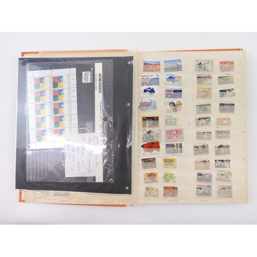 7021 - AUSTRALIA A collection of new and used stamps in three albums and a stock book to include booklets a... 