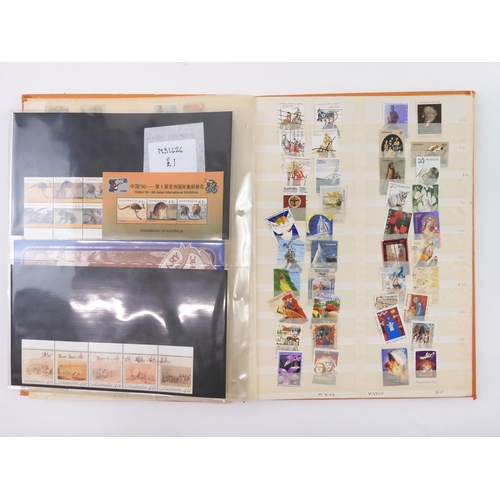 7021 - AUSTRALIA A collection of new and used stamps in three albums and a stock book to include booklets a... 