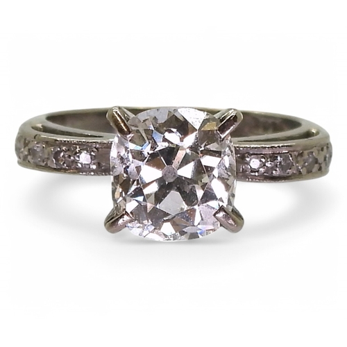 2774 - A CUSHION CUT DIAMOND RINGset in 18ct white gold, the substantial cushion cut of estimated approx 2c... 