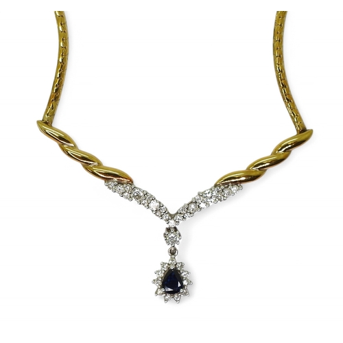 2778 - A SAPPHIRE & DIAMOND SUITEcomprising of an 18ct gold necklet with twisted detail, set with diamo... 