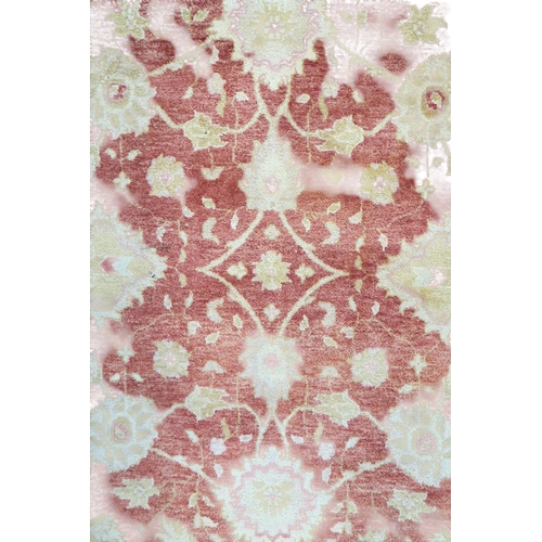 54 - A terracotta ground Zeigler style rug with cream floral patterned ground with floral border, 245cm l... 