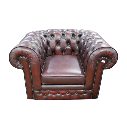 7 - A 20th century Thomas Lloyd oxblood leather upholstered three piece chesterfield style suite consist... 