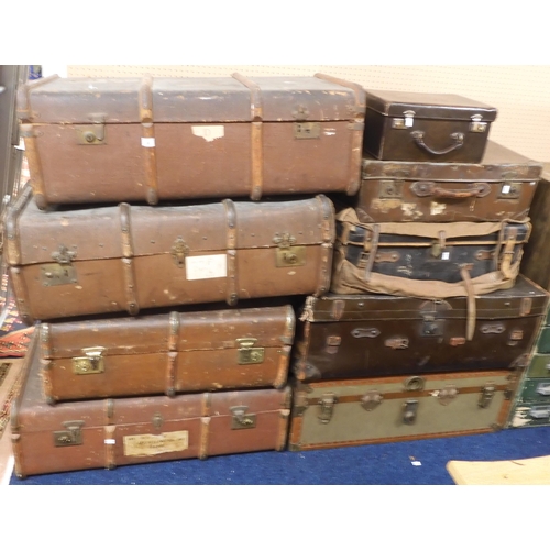 98 - A lot four assorted wood bound travel trunks, four assorted suit case/trunks and a small valise (9)&... 