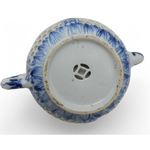 2274 - A CHINESE BLUE AND WHITE RETICULATED TEAPOTPainted with flowers,Kangxi,14.5cm high,Yixing miniature ... 