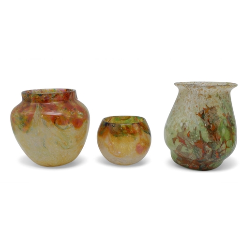 207 - A collection of Monart glass including a swirling red and yellow bulbous vase, a similar smaller exa... 