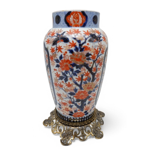 277 - A Chinese imari vase, mounted on a European brass base, 37cm