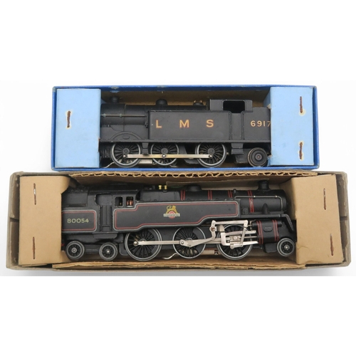 597 - A large quantity of boxed Hornby Dublo 00-gauge model railway components, including an Electric Trai... 