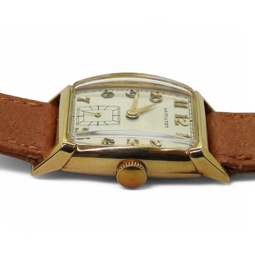 2869 - A HAMILTON WRISTWATCHthe case made in 10k gold, with silvered dial, gold coloured Art Deco style Ara... 