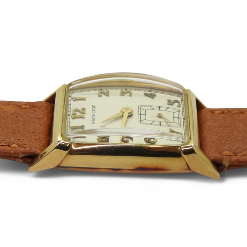 2869 - A HAMILTON WRISTWATCHthe case made in 10k gold, with silvered dial, gold coloured Art Deco style Ara... 