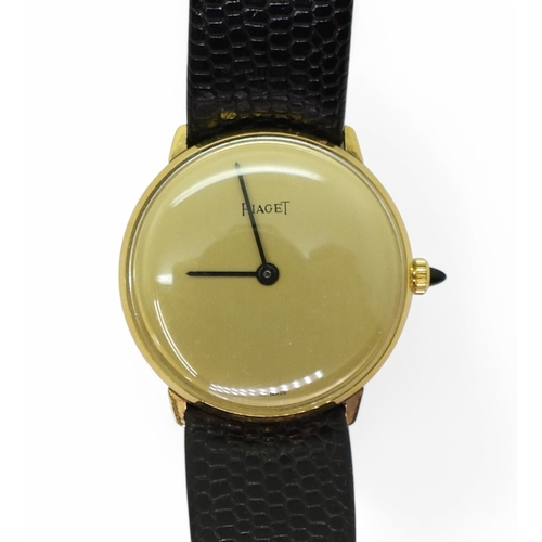 2870 - A PIAGET WATCH in 18k gold electroplate, the gold coloured plain dial, with black baton hands, ... 