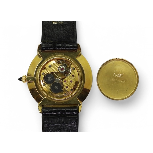 2870 - A PIAGET WATCH in 18k gold electroplate, the gold coloured plain dial, with black baton hands, ... 