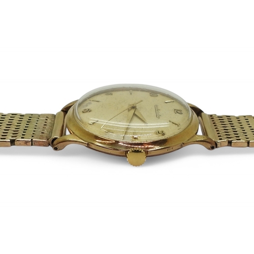 2872 - A JAEGER LE COULTREgold colour dial with arrow and Arabic numerals and dauphin hands, diameter of th... 