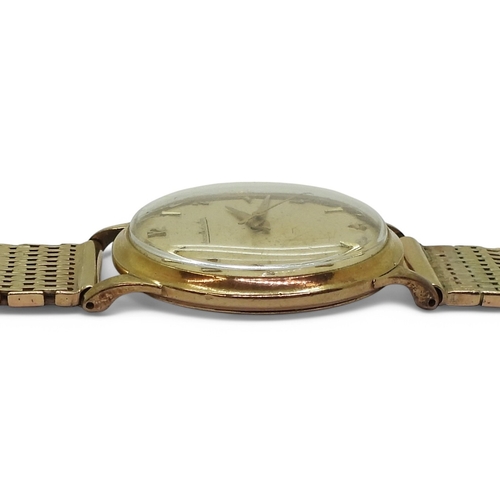 2872 - A JAEGER LE COULTREgold colour dial with arrow and Arabic numerals and dauphin hands, diameter of th... 