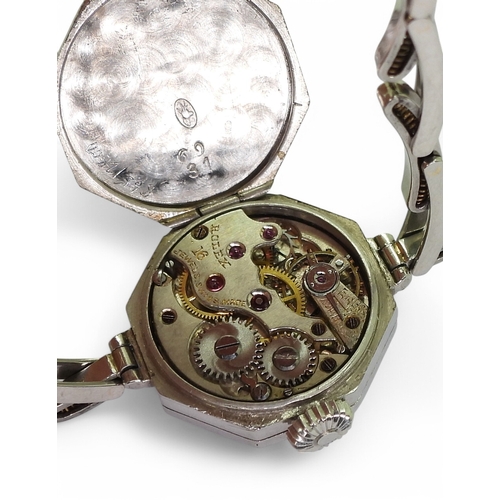 2874 - A ROLEX COCKTAIL WATCHcase and strap are made from platinum, with a double row of diamonds around th... 