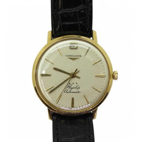 2884 - A LONGINES FLAGSHIP AUTOMATICwith an 18k gold case, with a cream dial gold coloured baton numeral an... 